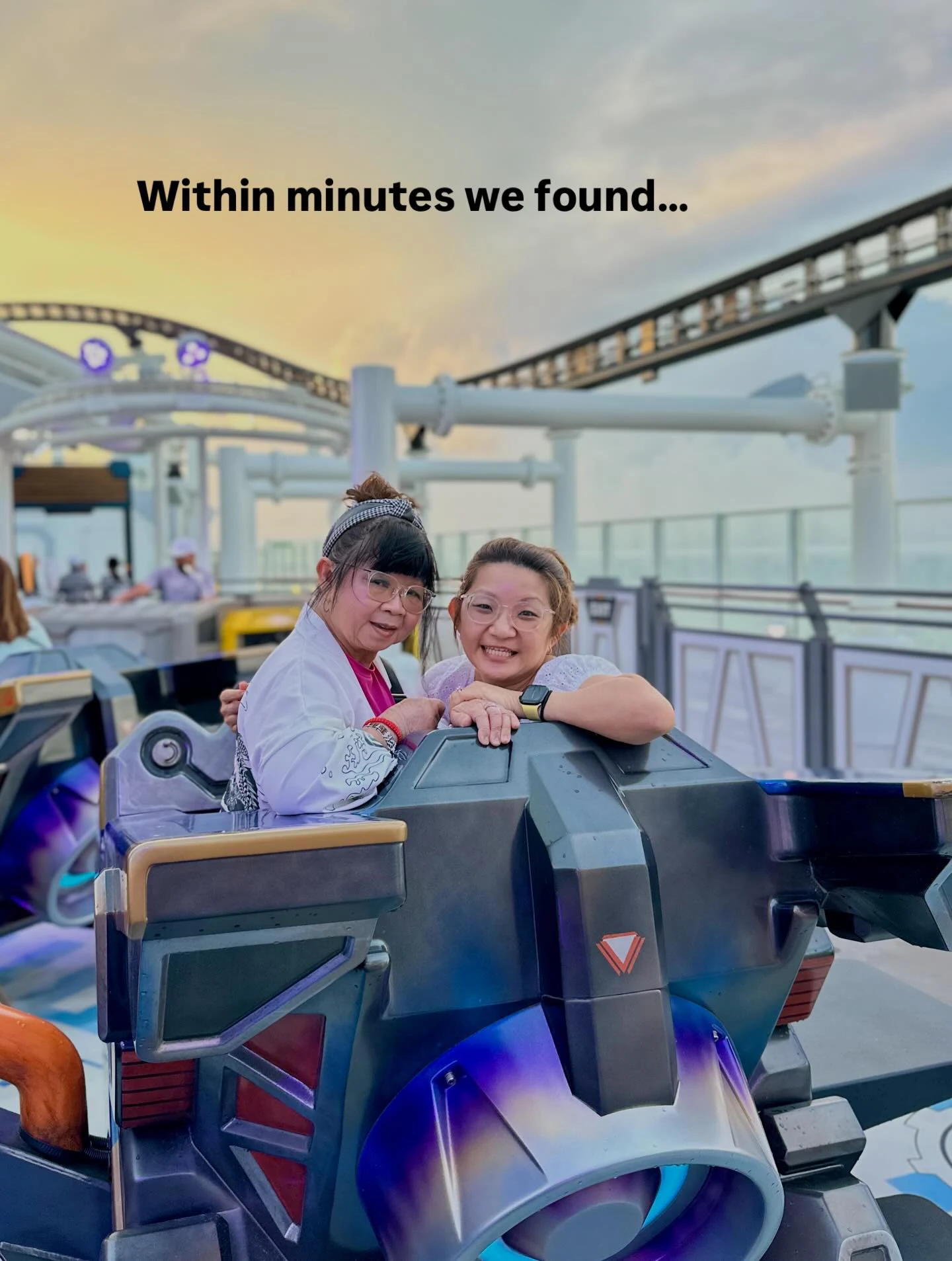 Passengers riding Ironcycle Test Run roller coaster at Marvel Landing on Disney Adventure cruise at sunset