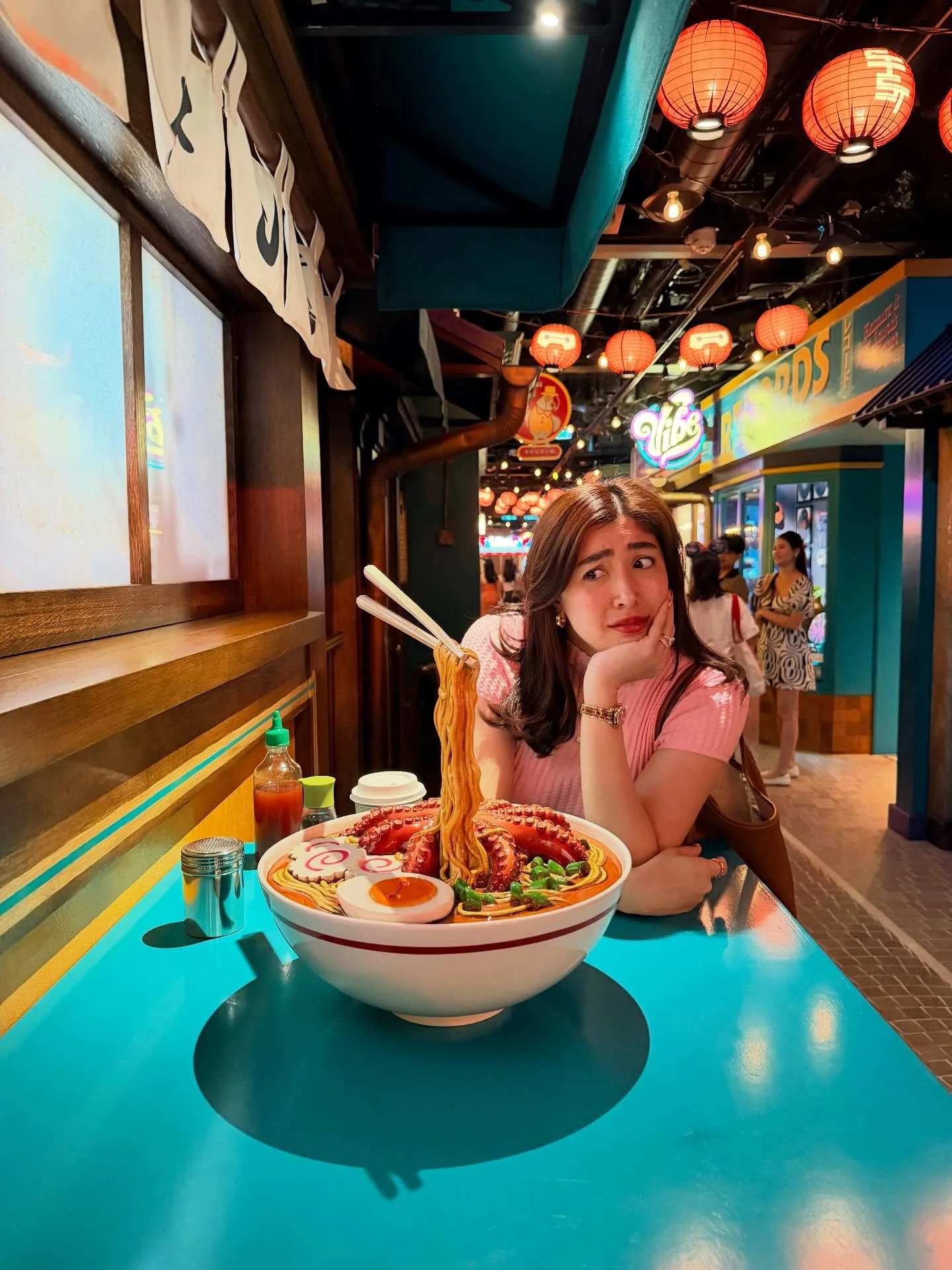 Giant ramen bowl photo spot at San Fransokyo Street themed area on Disney Adventure cruise ship