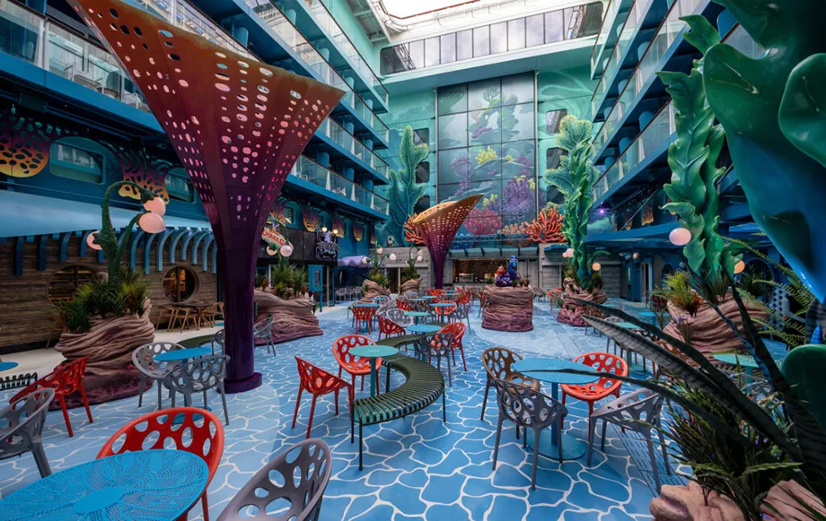 Disney Discovery Reef on the Disney Adventure — underwater-themed courtyard with coral sculptures and colourful seating