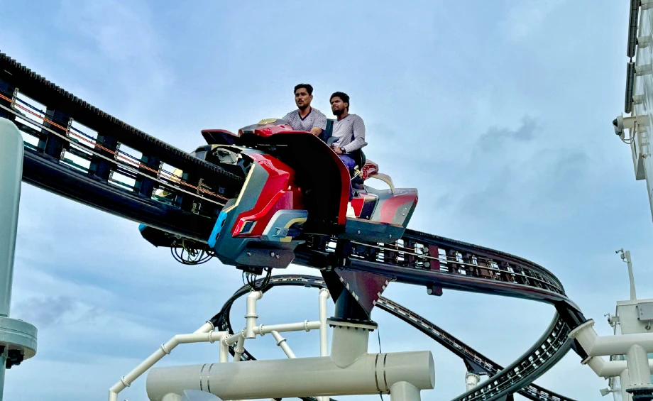Ironcycle Test Run roller coaster on Disney Adventure — 820-foot track, 30 feet above the upper deck, Disney Cruise Line's first coaster at sea