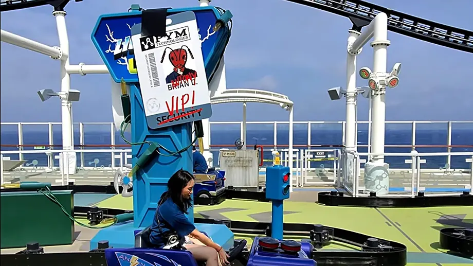 Pym Quantum Racers Ant-Man themed ride on the Disney Adventure — guest in a mini-car on the track at Marvel Landing