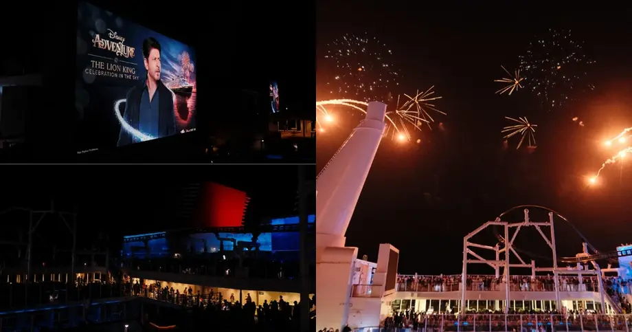 The Lion King Celebration in the Sky on the Disney Adventure — Shah Rukh Khan on screen and fireworks over ocean at night
